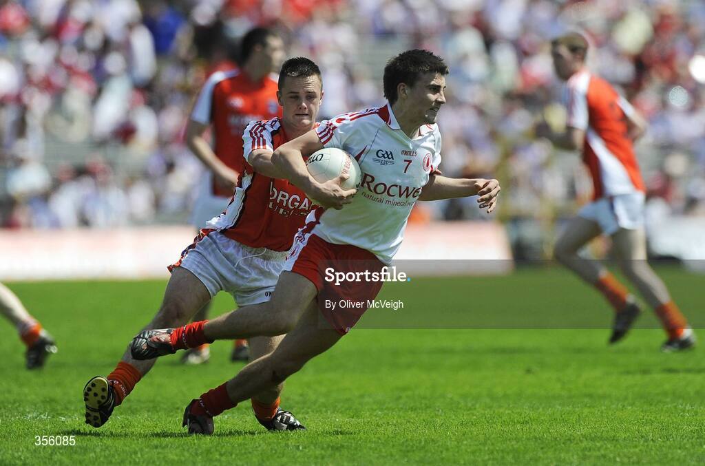 31 May 2009; Tiernan McCann, Tyrone, in action against Robbie Tasker, Armagh. Ulster GAA Football Minor Championship, Tyrone v Armagh, St. Tiernach's Park, Clones, Co.Monaghan. Picture credit: Oliver McVeigh / SPORTSFILE