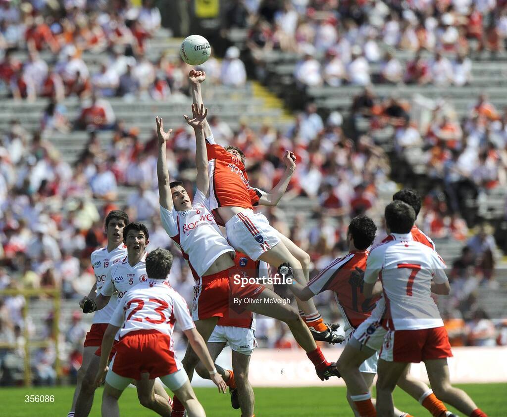 31 May 2009; Sean Warnock, Tyrone, in action against James Donnelly, Armagh. Ulster GAA Football Minor Championship, Tyrone v Armagh, St. Tiernach's Park, Clones, Co.Monaghan. Picture credit: Oliver McVeigh / SPORTSFILE