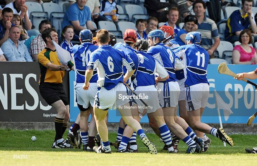31 May 2009; Galway and Laois players tussle off the ball for which referee Brian Galvin, Offaly, issues a red card to both Kevin Hayes, Galway, and James Walsh, Laois. Leinster GAA Hurling Senior Championship Quarter-Final, Laois v Galway, O'Moore Park, Portlaoise, Co. Laois. Picture credit: Stephen McCarthy / SPORTSFILE