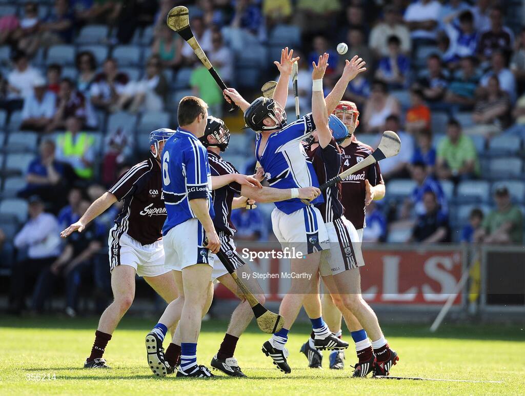 31 May 2009; Eamon Jackman, Laois, supported by team-mate Brian Campion, 6, is tackled by Galway players, from left, Aongus Callanan, Cyril Donnellan, Andy Smith and Joe Canning. Leinster GAA Hurling Senior Championship Quarter-Final, Laois v Galway, O'Moore Park, Portlaoise, Co. Laois. Picture credit: Stephen McCarthy / SPORTSFILE