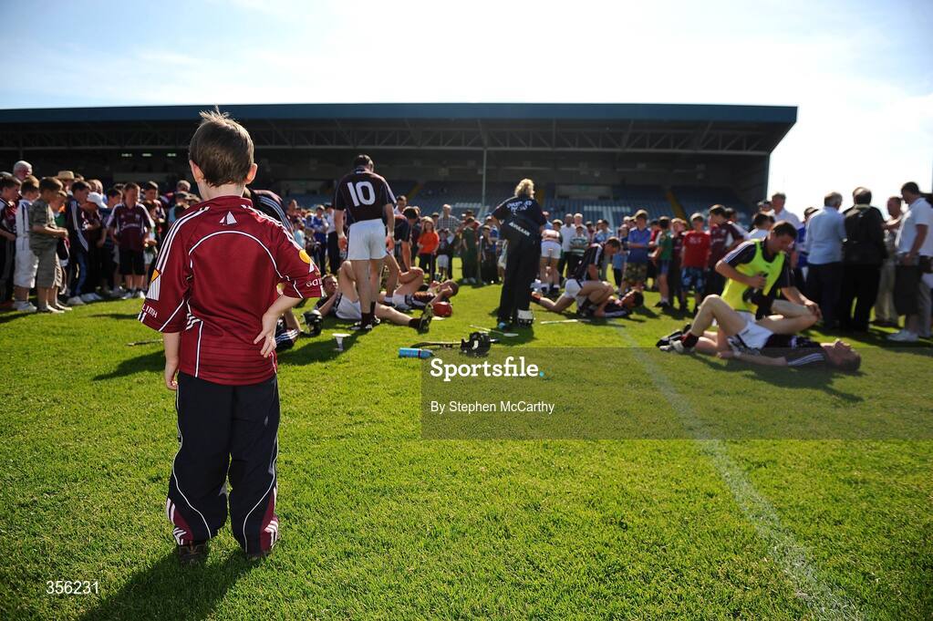 31 May 2009; A young Galway supporter watches his side warm down after the match. Leinster GAA Hurling Senior Championship Quarter-Final, Laois v Galway, O'Moore Park, Portlaoise, Co. Laois. Picture credit: Stephen McCarthy / SPORTSFILE