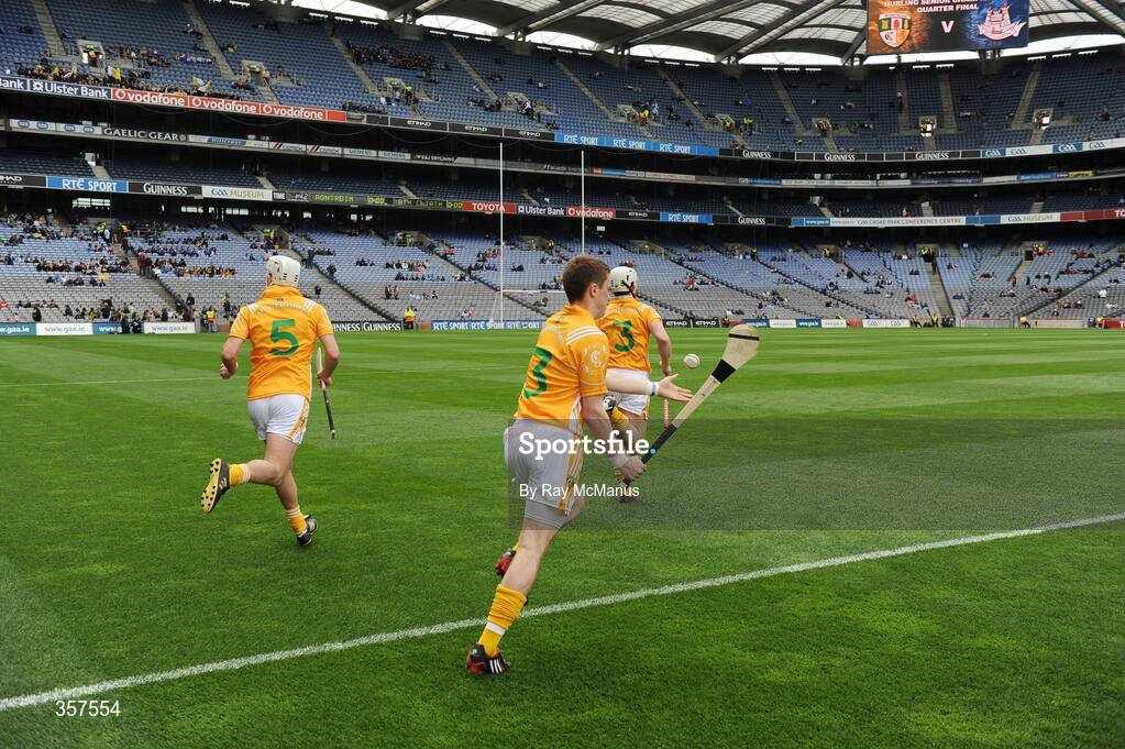 7 June 2009; The Antrim captain Neil McGarry leads team-mates Conor John McGourty and Johnny Campbell, left, out before the game. Leinster GAA Hurling Senior Championship First Round, Dublin v Antrim, Croke Park, Dublin. Picture credit: Ray McManus / SPORTSFILE