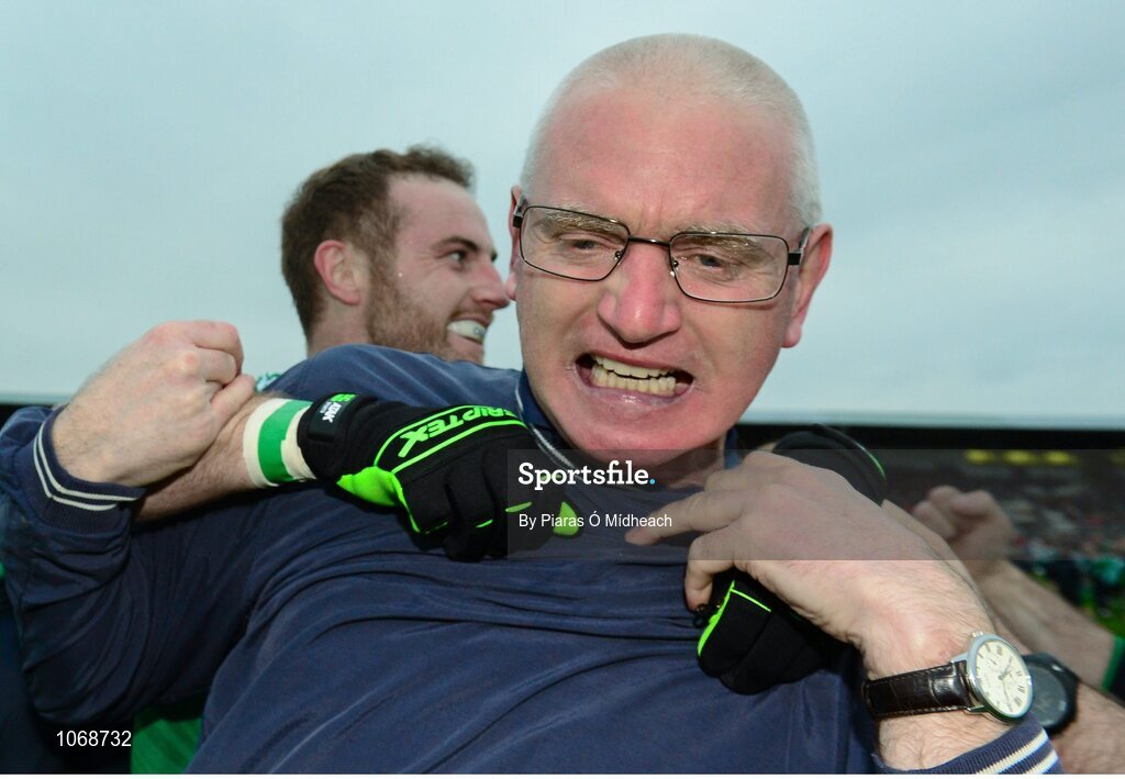18 October 2015; Sarsfields manager John Crofton celebrates with Alan Smith, behind, after the game. Kildare County Senior Football Championship Final, Athy v Sarsfields. St Conleth's Park, Newbridge, Co. Kildare. Picture credit: Piaras Ó Mídheach / SPORTSFILE