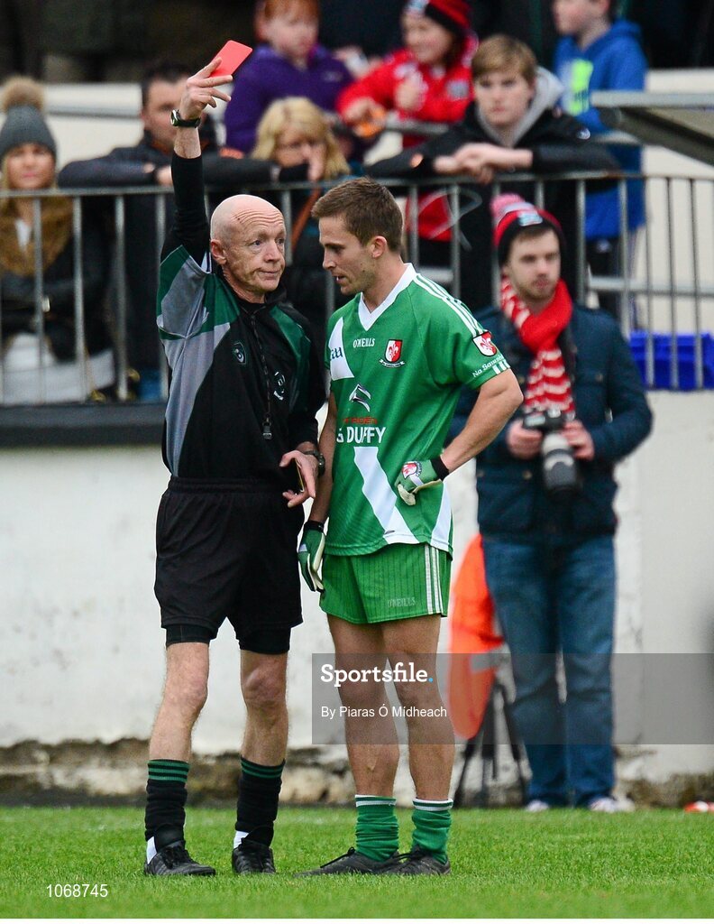 18 October 2015; Conor Tiernan, Sarsfields, is shown the red card by referee Liam Herbert. Kildare County Senior Football Championship Final, Athy v Sarsfields. St Conleth's Park, Newbridge, Co. Kildare. Picture credit: Piaras Ó Mídheach / SPORTSFILE