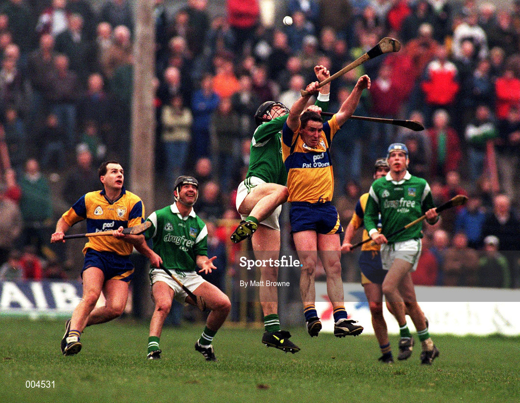 22 March 1998; Shane O'Neill of Limerick and Colin Lynch of Clare go up for a high ball watched by Liam Doyle of Clare, left, and Mike Galligan of Limerick during the Church & General National Hurling League Division 1A match between Limerick and Clare at the Gaelic Grounds in Limerick. Photo by Matt Browne/Sportsfile