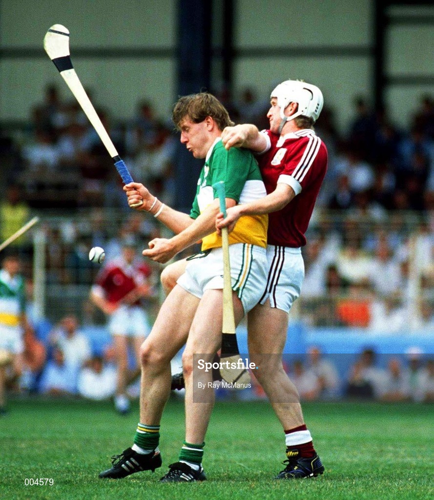 5 August 1990; Daithi Regan of Offaly in action against Tony Keady of Galway during the All-Ireland Hurling Championship Semi-Final match between Galway and Offaly at Croke Park in Dublin. Photo by Ray McManus/Sportsfile