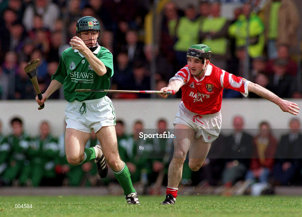 26 May 1996. Limerick's Damien Quigley gets away from Cork's Timmy Kelleher. Munster Hurling Championship, Cork v Limerick, Páirc U’ Chaoimh, Cork. Picture Credit: Ray McManus/SPORTSFILE.