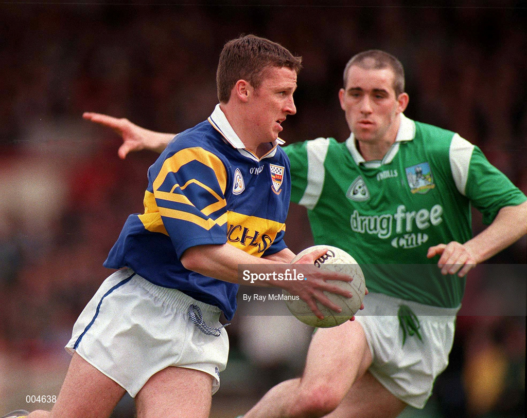 10 May 1998; Declan Browne of Tipperary in action against Diarmuid Sheedy of Limerick during the Munster GAA Football Senior Championship First Round match between Limerick and Tipperary at Gaelic Grounds in Limerick. Photo by Ray McManus/Sportsfile