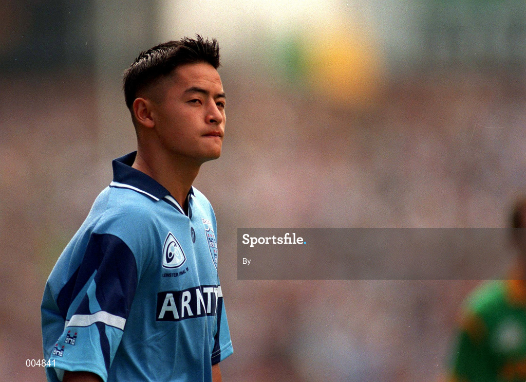 30 July 1995. Jason Sherlock, Dublin looks up to Hill 16 during the parade prior to the game. Leinster Football Final, Dublin v Meath, Croke Park. Picture Credit: Ray McManus/SPOIRTSFILE.