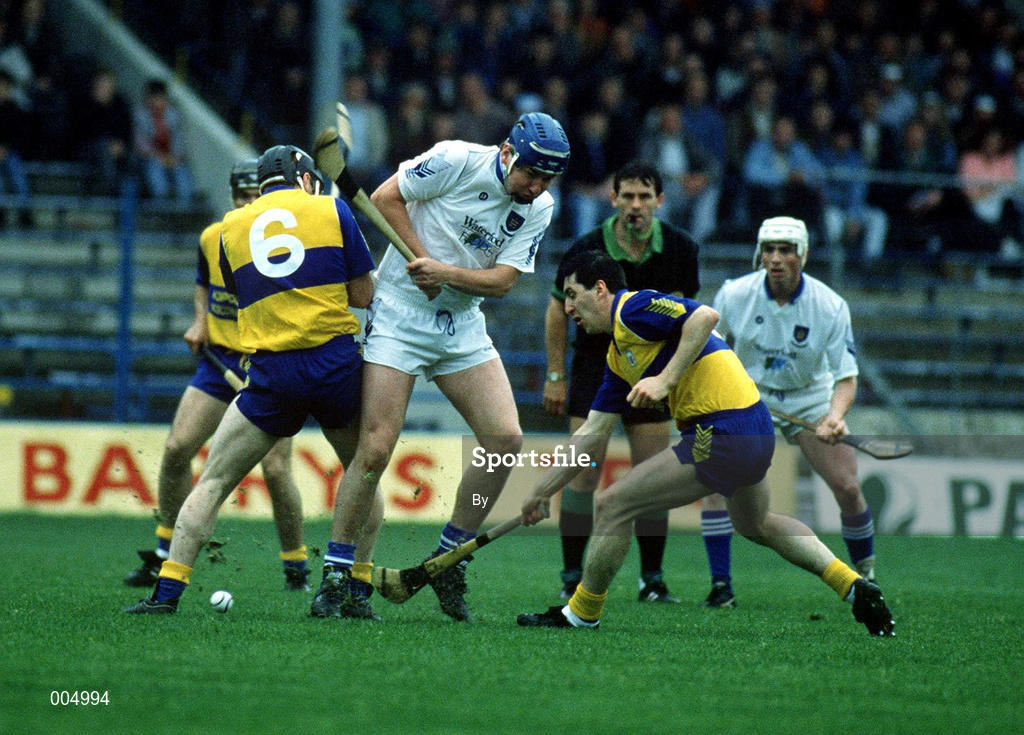 31 May 1992, Liam O'Connor Waterford in action against Jim McInerney (6) Clare, Semple Stadium, Thurles. Picture Credit: Ray McManus/SPORTSFILE