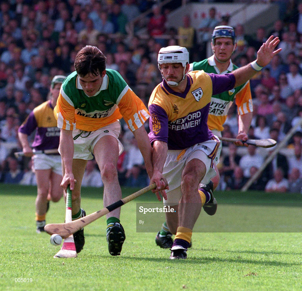 17 July 1994, Johnny Pilkington Offaly in action against Martin Storey Wexford, Leinster hurling final, Picture Credit: Ray McManus/SPORTSFILE
