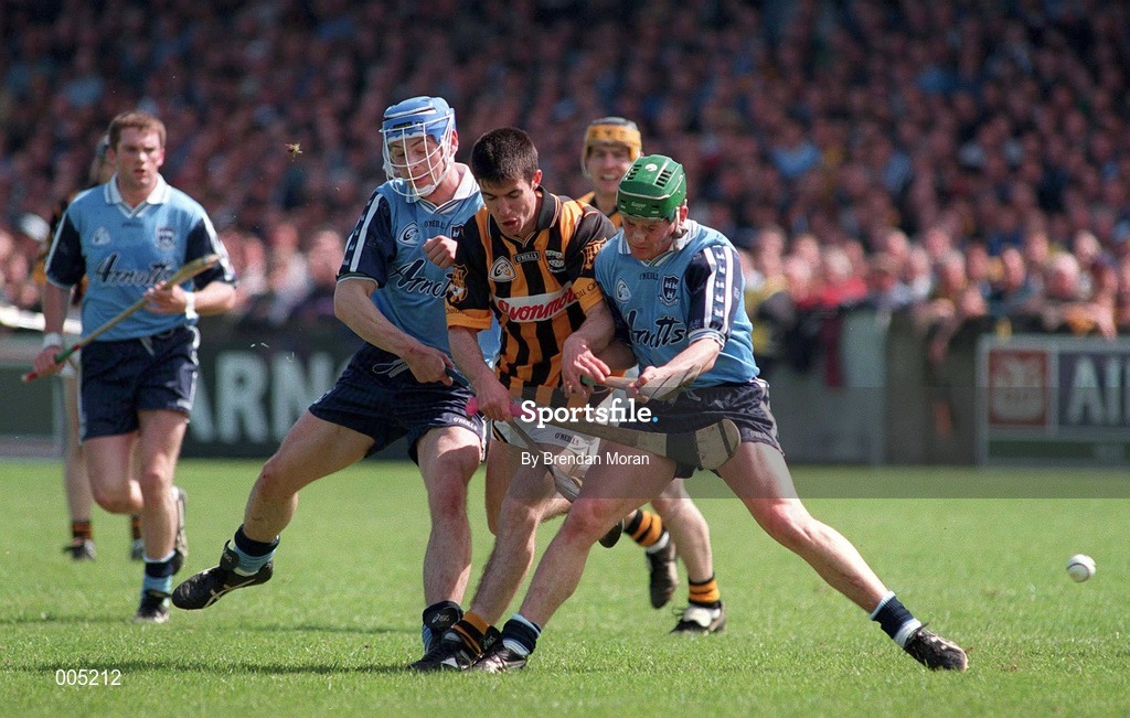 31 May 1998; Philip Larkin of Kilkenny in action against Stephen Perkins, left, and Conor McGann of Dublin during the Leinster GAA Hurling Senior Championship Quarter-Final match betwenn Dublin and Kilkenny at Parnell Park in Dublin. Photo by Brendan Moran/Sportsfile
