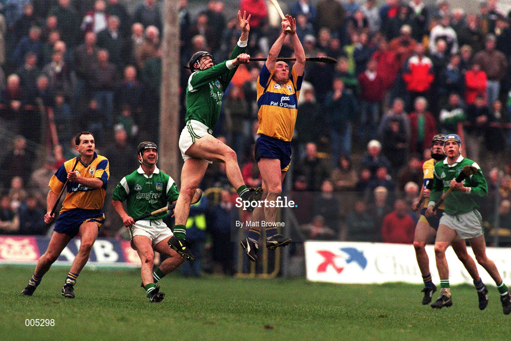 22 March 1998; Shane O'Neill of Limerick and Colin Lynch of Clare go up for a high ball watched by Liam Doyle of Clare, left, and Mike Galligan of Limerick during the Church & General National Hurling League Division 1A match between Limerick and Clare at the Gaelic Grounds in Limerick. Photo by Matt Browne/Sportsfile