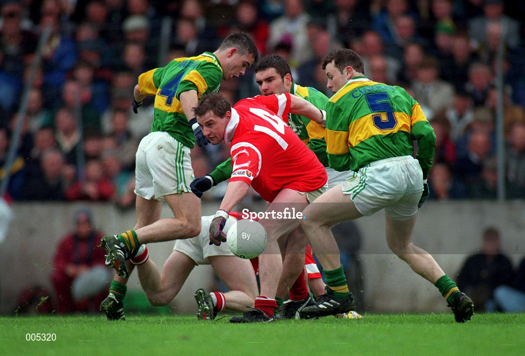 2 March 1997. Action features, from left, Killian Burns, Kerry, Stephen O'Brien, Cork  Barry O'Shea, Kerry and Seamus Moynihan, Kerry. National Football League Final, Kerry v Cork, Páirc U’ Chaoimh, Cork. Picture Credit: Ray McManus/SPORTSFILE.