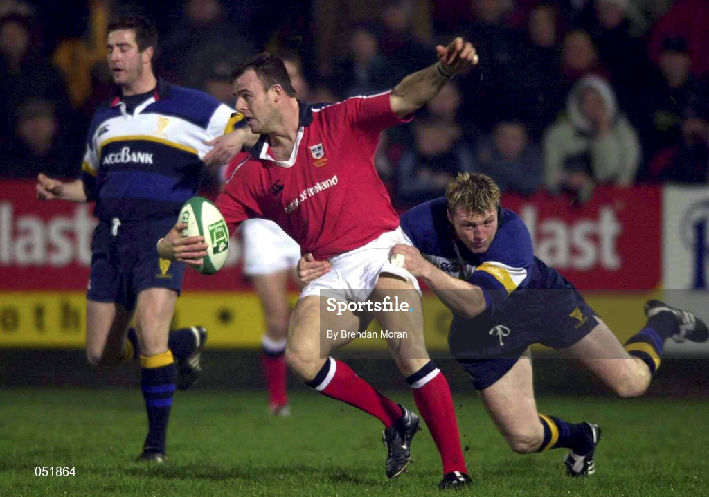 5 January 2001; John O'Neill of Munster is tackled by Eric Miller of Leinster during the Interprovincial friendly match between Munster and Leinster at Musgrave Park in Cork. Photo by Brendan Moran/Sportsfile