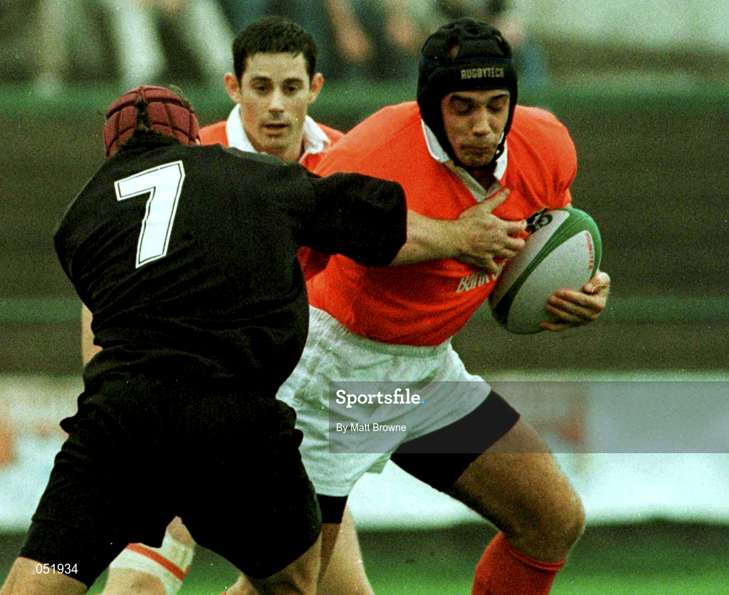 26 September 1998: Alan Quinlan of Munster is tackled by Brett Sinkinson of Neath during the  Heineken Cup Pool B Round 2 match between Munster and Neath at Musgrave Park in Cork. Photo by Matt Browne/Sportsfile