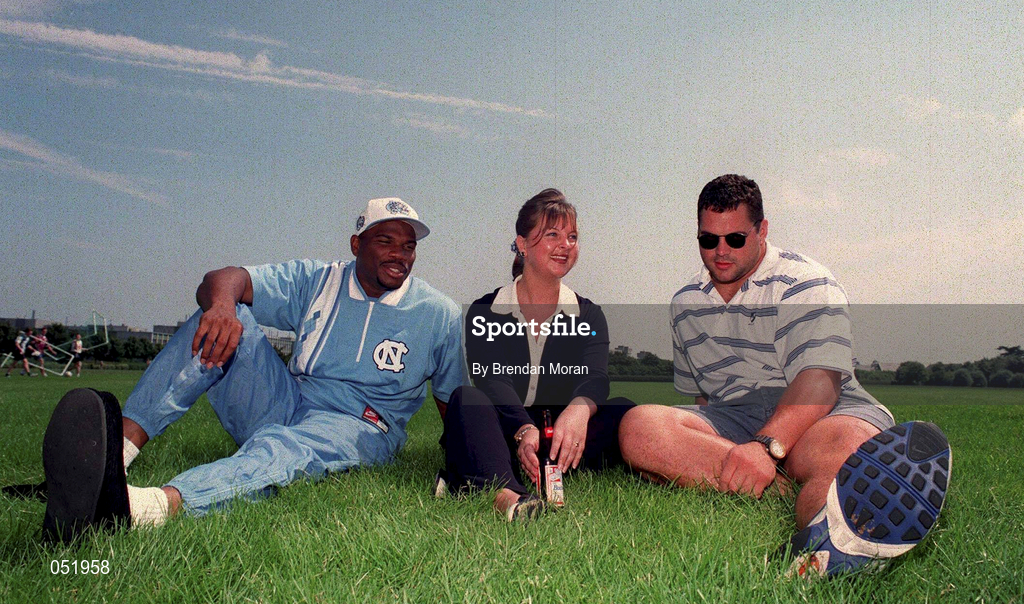 22 July 1997; The Sheer size of the Budweiser American Bowl literally came home today as the Pittsburgh Steelers and the Chicago Bears touched-down in Dublin and headed for UCD and their first training session before the clash of the titans this Sunday, 27th July at Croke Park. Pictured is Brand Manager of Budweiser Grainne Harkin, centre, with with Curtis Conway, left, and Jim Flanagan of the Chicago Bears. Photo by Brendan Moran/Sportsfile