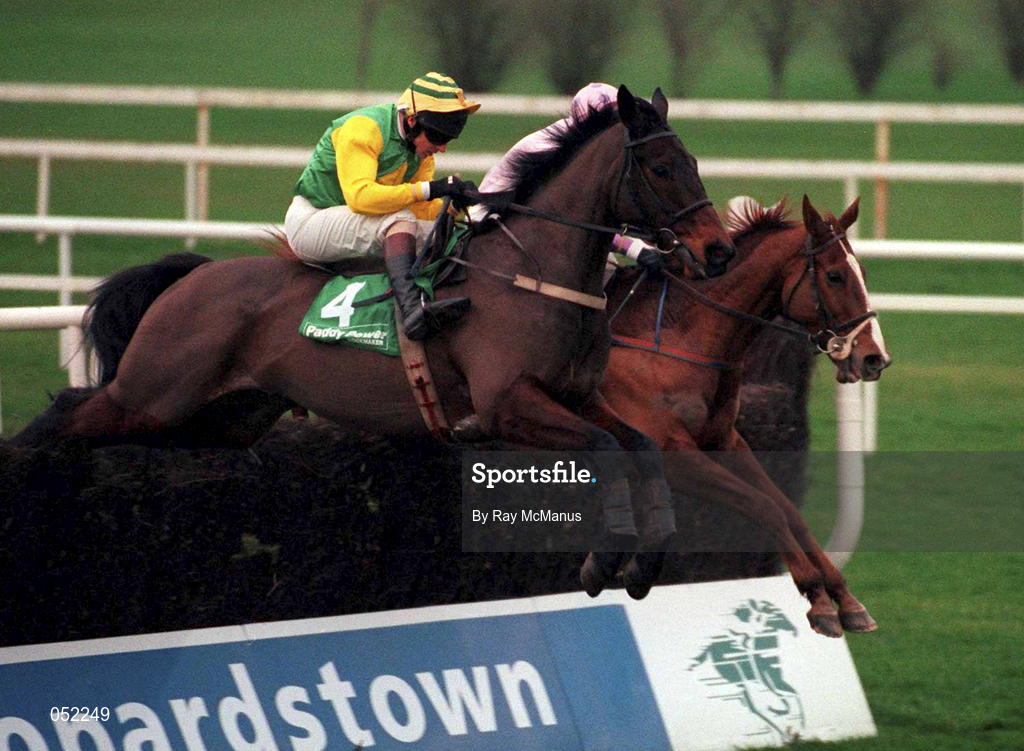 26 December 2000; Pauls Run, with Shay Barry up, and Be Home Early, with Mark Madden up, jumps the last during the Paddy Power Online Handicap Steeplechase on Day One of the Leopardstown Christmas Festival at Leopardstown Racecourse in Dublin. Photo by Ray McManus/Sportsfile