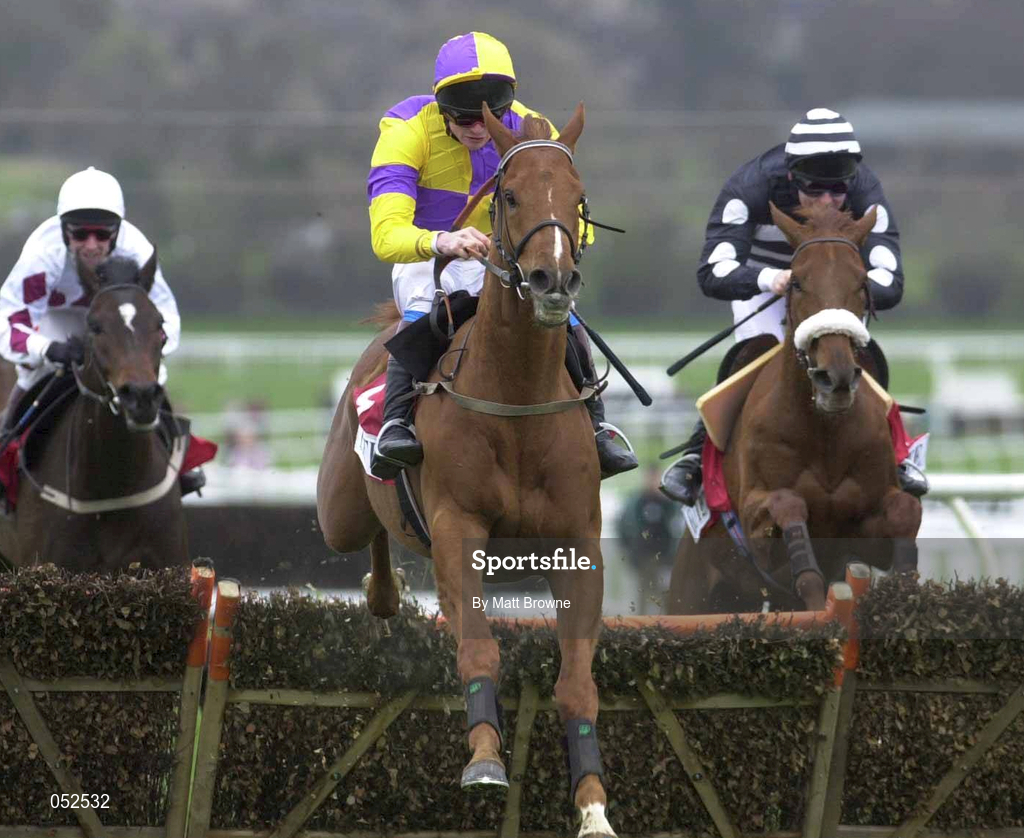 16 March 2000; General Cloney, with Ruby Walsh up, centre, jumps the last, first time round, during the Elite Racing Club Triumph Hurdle on Day Three of the Cheltenham Racing Festival at Prestbury Park in Cheltenham, England. Photo by Matt Browne/Sportsfile