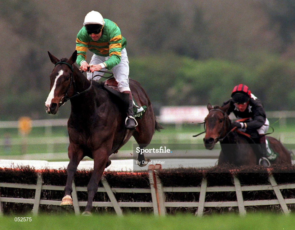 24 April 1997; Grimes, with Conor O'Dwyer up, jumps the last ahead of Snow Falcon, with Norman Williamson up, on their way to winning the Murphy's Irish Stout Champion Four Year Old Hurdle at Punchestown Racecourse in Kildare. Photo by David Maher/Sportsfile