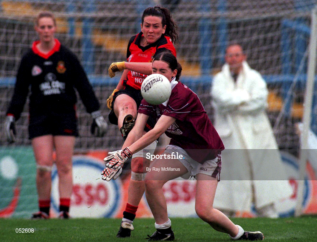 1 October 2000; Jacqui Clarke of Down is tackled by Emma Curley of Galway during the All-Ireland Ladies Junior Football Final match between Down and Galway at Croke Park in Dublin. Photo by Ray McManus/Sportsfile
