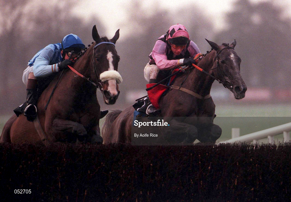 31 December 2000; Rose of Inchiquin, with Tom Treacy up, rigtht, jumps the last ahead of Brush The Flag, with AK Wyse up, William Neville & Sons Novice Steeplechase on day three of the Leopardstown Christmas Festival at Leopardstown Racecourse in Dublin. Photo by Aoife Rice/Sportsfile