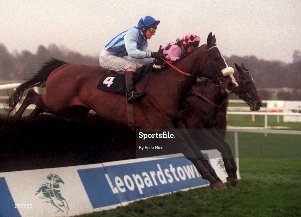 31 December 2000; Brush the Flag, with AK Wyse up, left, jump the last first time round, ahead of Rose of Inchiquin, with Tom Treacy up during the William Neville & Sons Novice Steeplechase on day three of the Leopardstown Christmas Festival at Leopardstown Racecourse in Dublin. Photo by Aoife Rice/Sportsfile