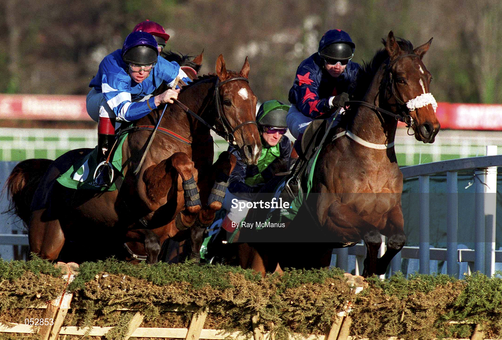 27 December 2000; Lisaan, with Barry Cash up, left, and Bodakker, with Mark Sullivan up, jumps the last, first time round, during the paddypower.com Festival 3-Y-O Hurdle on Day Two of the Leopardstown Christmas Festival at Leopardstown Racecourse in Dublin. Photo by Ray McManus/Sportsfile