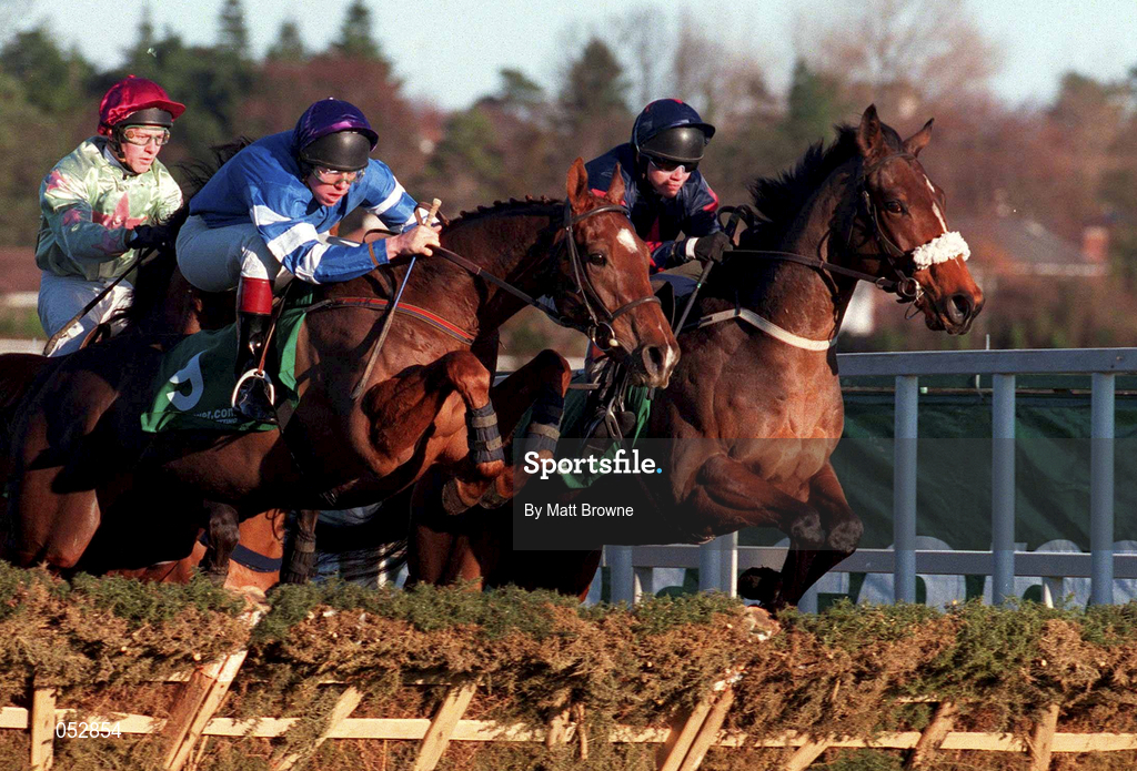 27 December 2000; Lisaan, with Barry Cash up, left, and Bodakker, with Mark Sullivan up, during the paddypower.com Festival 3-Y-O Hurdle on Day Two of the Leopardstown Christmas Festival at Leopardstown Racecourse in Dublin. Photo by Matt Browne/Sportsfile