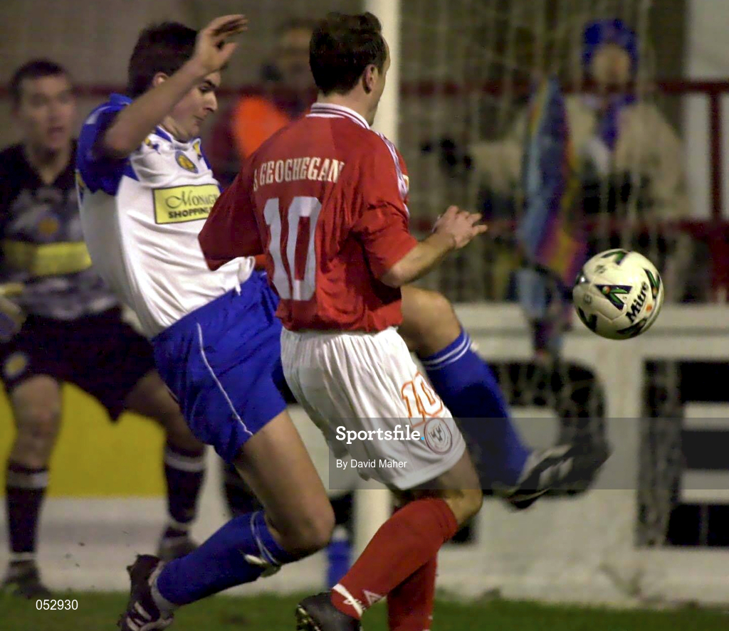 7 January 2001; Mick Scully of Monaghan United in action against Stephen Geoghegan of Shelbourne during the FAI Harp Lager Cup Second Round match between Shelbourne and Monaghan United at Tolka Park in Dublin. Photo by David Maher/Sportsfile