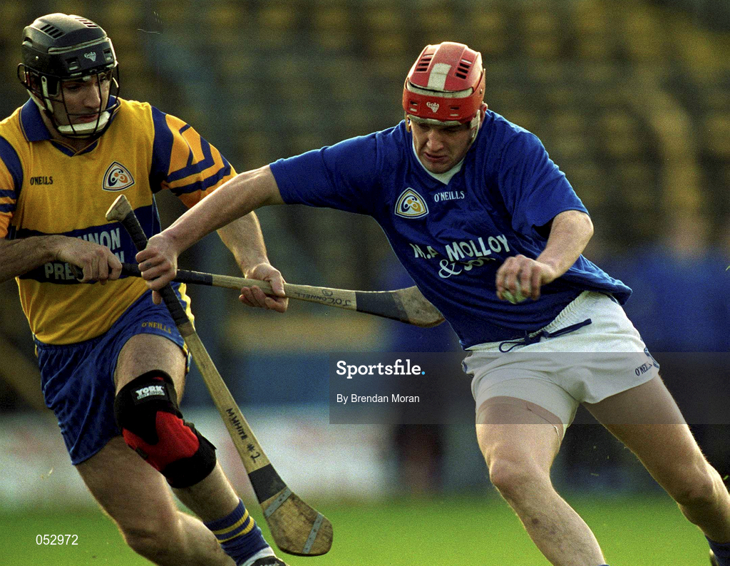 26 November 2000; Michael White of Mount Sion in action against John O'Connell of Sixmilebridge during the AIB Munster Senior Hurling Club Championship Final match between Sixmilebridge and  Mount Sion at Semple Stadium in Thurles. Photo by Brendan Moran/Sportsfile