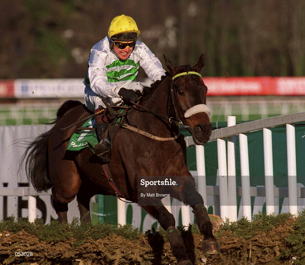 27 December 2000; Native Estates, with Charlie Swan up,  jumps the last on their way to finishing third in the Paddy Power Online Handicap Hurdle on Day Two of the Leopardstown Christmas Festival at Leopardstown Racecourse in Dublin. Photo by Matt Browne/Sportsfile