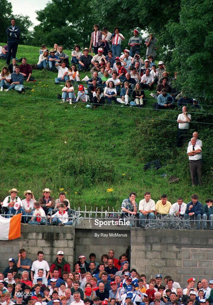 23 July 1995. Supporters watch on during the game. Ulster Senior Football Championship Final, Tyrone v Cavan, St. Tighearnach's Park, Clones, Co. Monaghan. Picture credit: Ray McManus / SPORTSFILE