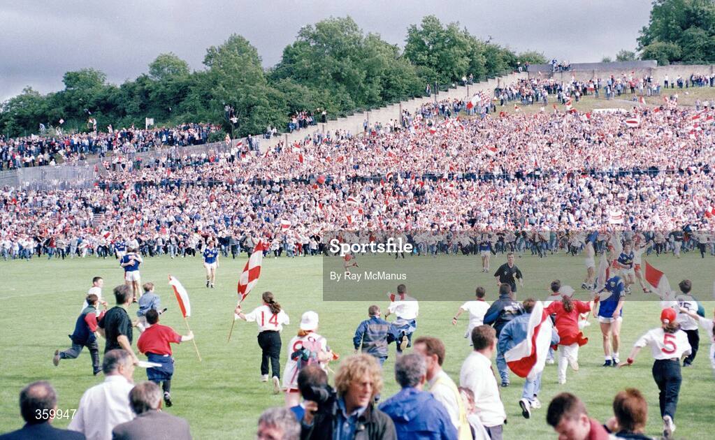 23 July 1995; Tyrone supporters run onto the pitch following Tyrone's 2-13 to 0-7 victory over Cavan. Ulster Senior Football Championship Final, Tyrone v Cavan, St. Tighearnach's Park, Clones, Co. Monaghan. Picture credit: Ray McManus / SPORTSFILE