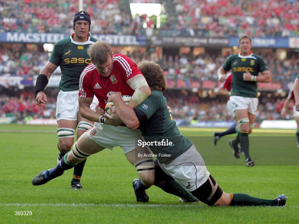 20 June 2009; Tom Croft, British and Irish Lions, goes over to score the Lions first try, despite the tackle of Frans Steyn, South Africa. 1st Test, South Africa v British and Irish Lions, ABSA Stadium, Durban, South Africa. Picture credit: Andrew Fosker / SPORTSFILE