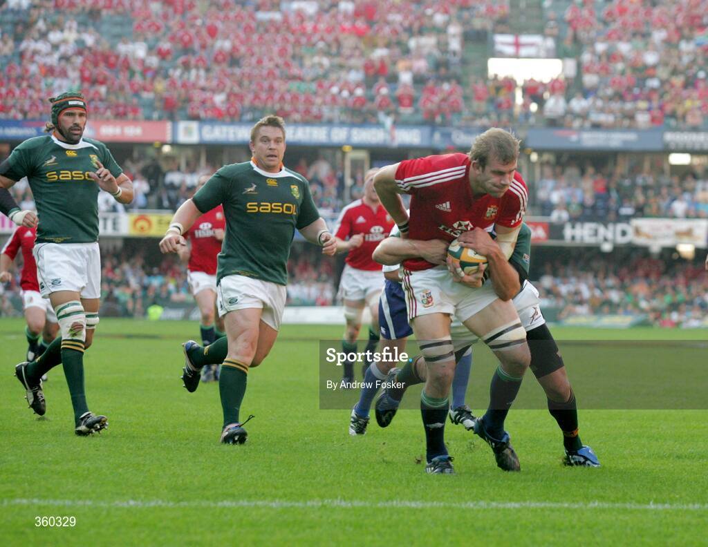 20 June 2009; Tom Croft, British and Irish Lions, goes over to score the Lions first try, despite the tackle of Frans Steyn, South Africa. 1st Test, South Africa v British and Irish Lions, ABSA Stadium, Durban, South Africa. Picture credit: Andrew Fosker / SPORTSFILE