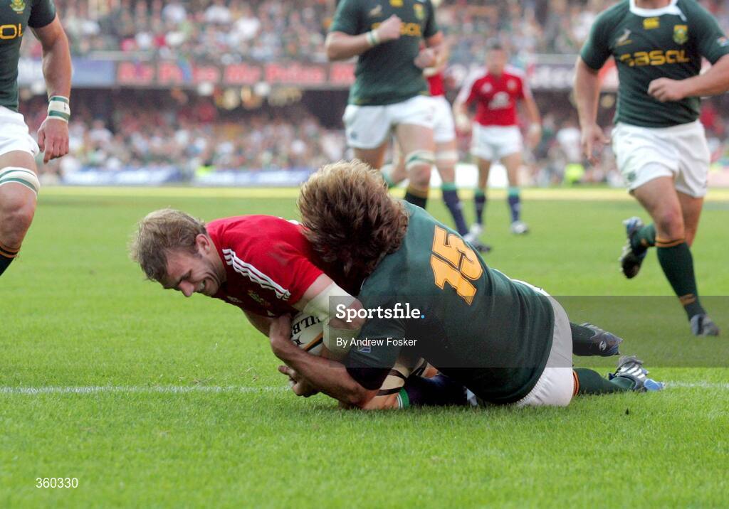 20 June 2009; Tom Croft, British and Irish Lions, goes over to score the Lions first try, despite the tackle of Frans Steyn, South Africa. 1st Test, South Africa v British and Irish Lions, ABSA Stadium, Durban, South Africa. Picture credit: Andrew Fosker / SPORTSFILE