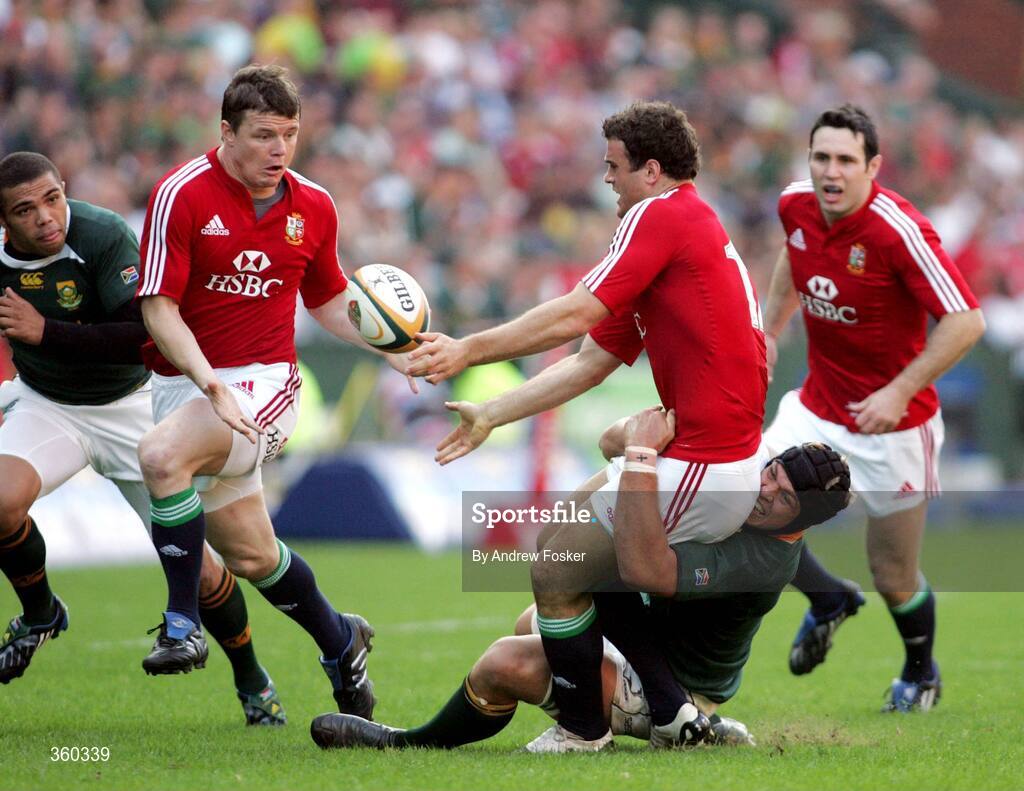20 June 2009; Jamie Roberts, British and Irish Lions, gets a pass away to team-mate Brian O'Driscoll, left, while being tackled by Juan Smith, South Africa. 1st Test, South Africa v British and Irish Lions, ABSA Stadium, Durban, South Africa. Picture credit: Andrew Fosker / SPORTSFILE