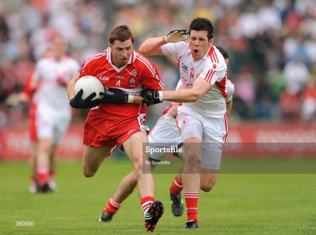 21 June 2009; Gerard O'Kane, Derry, in action against Sean Cavanagh, Tyrone. GAA Football Ulster Senior Championship Semi-Final, Tyrone v Derry, Casement Park, Belfast, Co. Antrim. Photo by Sportsfile