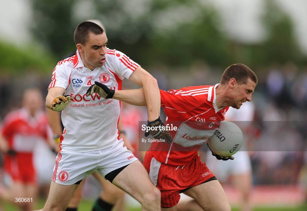 21 June 2009; Barry McGuigan, Derry, in action against Ryan McMenamin, Tyrone. GAA Football Ulster Senior Championship Semi-Final, Tyrone v Derry, Casement Park, Belfast, Co. Antrim. Photo by Sportsfile