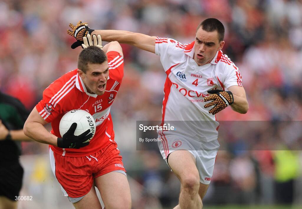 21 June 2009; Mark Lynch, Derry, in action against Ryan McMenamin, Tyrone. GAA Football Ulster Senior Championship Semi-Final, Tyrone v Derry, Casement Park, Belfast, Co. Antrim. Photo by Sportsfile