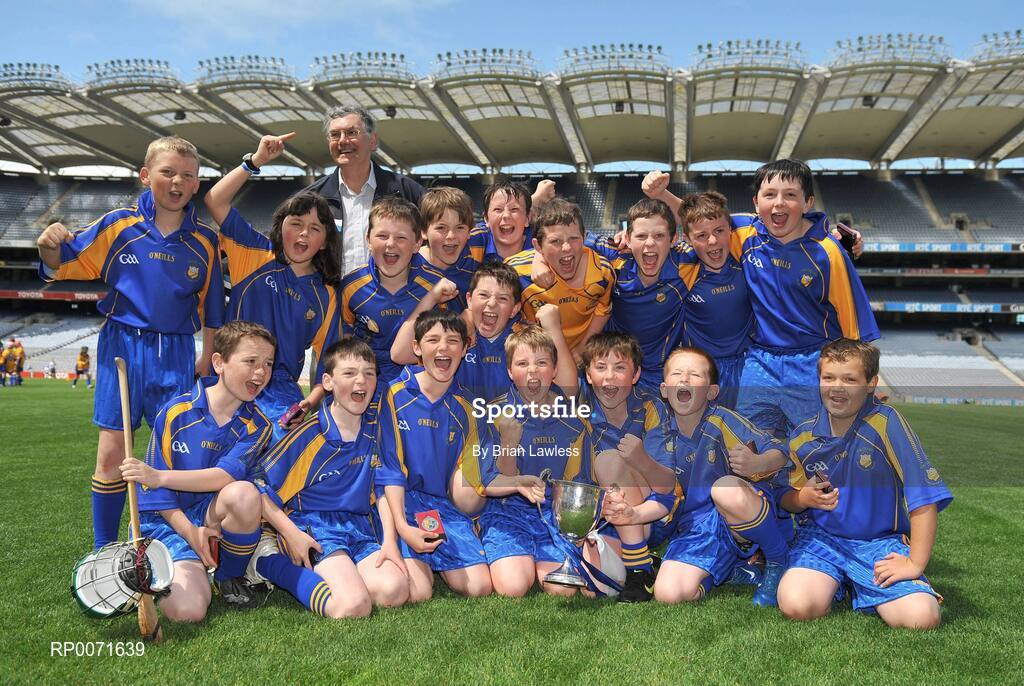 18 June 2009; Our Ladys BNS team celebrate with the Corn Harry Conlon after the match. Allianz Cumann na mBunscoil Finals, Our Ladys BNS, Ballinteer, v Scoil Colm, Crumlin, Corn Harry Conlon, Croke Park, Dublin. Picture credit: Brian Lawless / SPORTSFILE