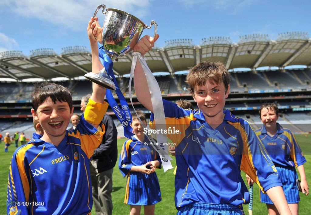 18 June 2009; Our Ladys BNS captains Barry Mannion, left, and Sean Casserly, celebrate with the Corn Harry Conlon after the match. Allianz Cumann na mBunscoil Finals, Our Ladys BNS, Ballinteer, v Scoil Colm, Crumlin, Corn Harry Conlon, Croke Park, Dublin. Picture credit: Brian Lawless / SPORTSFILE