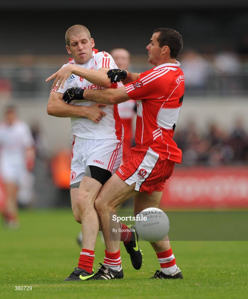 21 June 2009; Kevin Hughes, Tyrone, in action against Chrissy McKaigue, Derry. GAA Football Ulster Senior Championship Semi-Final, Tyrone v Derry, Casement Park, Belfast, Co. Antrim. Photo by Sportsfile