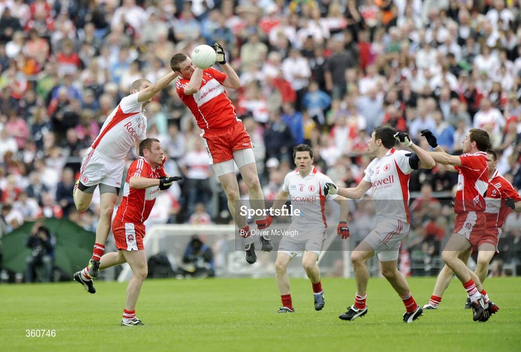 21 June 2009; Joe Diver, Derry, in action against Kevin Hughes, Tyrone. GAA Football Ulster Senior Championship Semi-Final, Tyrone v Derry, Casement Park, Belfast, Co. Antrim. Picture credit: Oliver McVeigh / SPORTSFILE