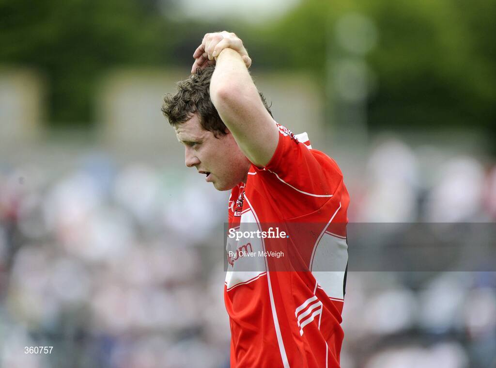 21 June 2009; A dejected Barry McGoldrick, Derry, after the final whistle. GAA Football Ulster Senior Championship Semi-Final, Tyrone v Derry, Casement Park, Belfast, Co. Antrim. Picture credit: Oliver McVeigh / SPORTSFILE
