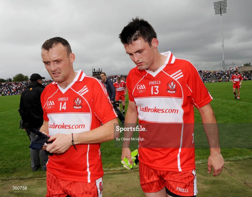 21 June 2009;A dejected Paddy Bradley and Eoin Bradley, Derry, walk off the pitch after the game. GAA Football Ulster Senior Championship Semi-Final, Tyrone v Derry, Casement Park, Belfast, Co. Antrim. Picture credit: Oliver McVeigh / SPORTSFILE