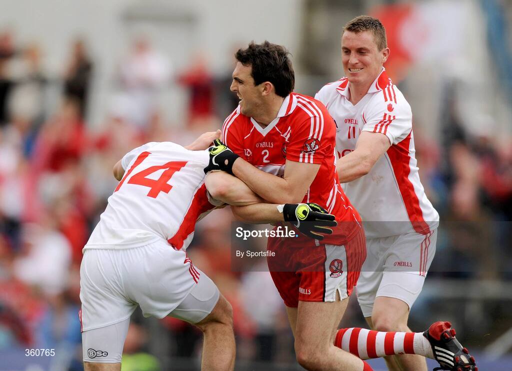 21 June 2009; Kevin McGuckin, Derry, in an incident with Sean Cavanagh, Tyrone, for which he was sent off for. GAA Football Ulster Senior Championship Semi-Final, Tyrone v Derry, Casement Park, Belfast, Co. Antrim. Photo by Sportsfile