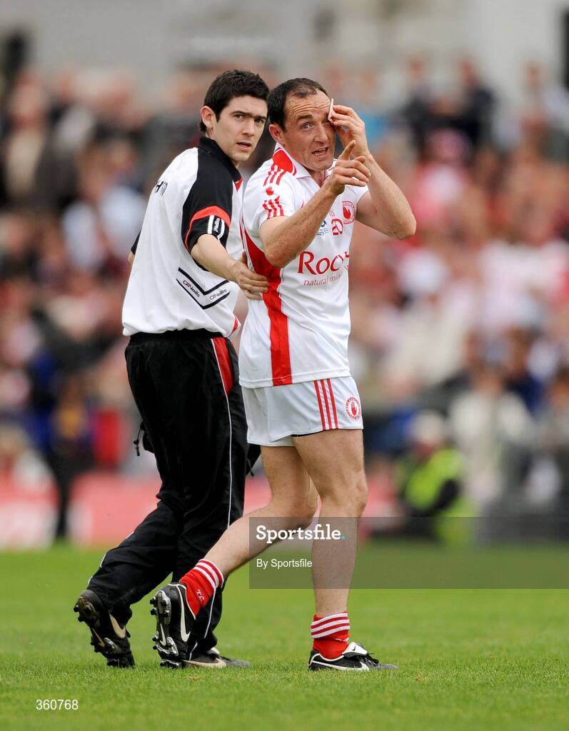 21 June 2009; Brian Dooher, Tyrone, gestures to Barry McGuigan, Derry, as he is taken off as a blood substitute, having previously been involved in an incident with him. GAA Football Ulster Senior Championship Semi-Final, Tyrone v Derry, Casement Park, Belfast, Co. Antrim. Photo by Sportsfile