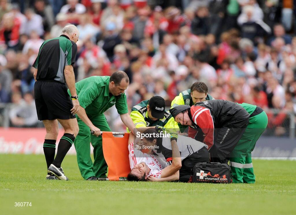 21 June 2009; Joe McMahon, Tyrone, is attended to by medical staff. GAA Football Ulster Senior Championship Semi-Final, Tyrone v Derry, Casement Park, Belfast, Co. Antrim. Photo by Sportsfile